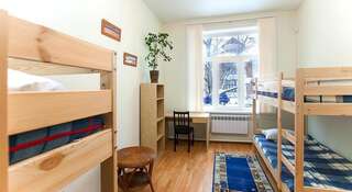 Гостиница Дом охотника Томск Кровать в общем четырехместном номере-1